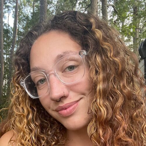 Maddie is a young woman who teaches yoga for Om Reset®